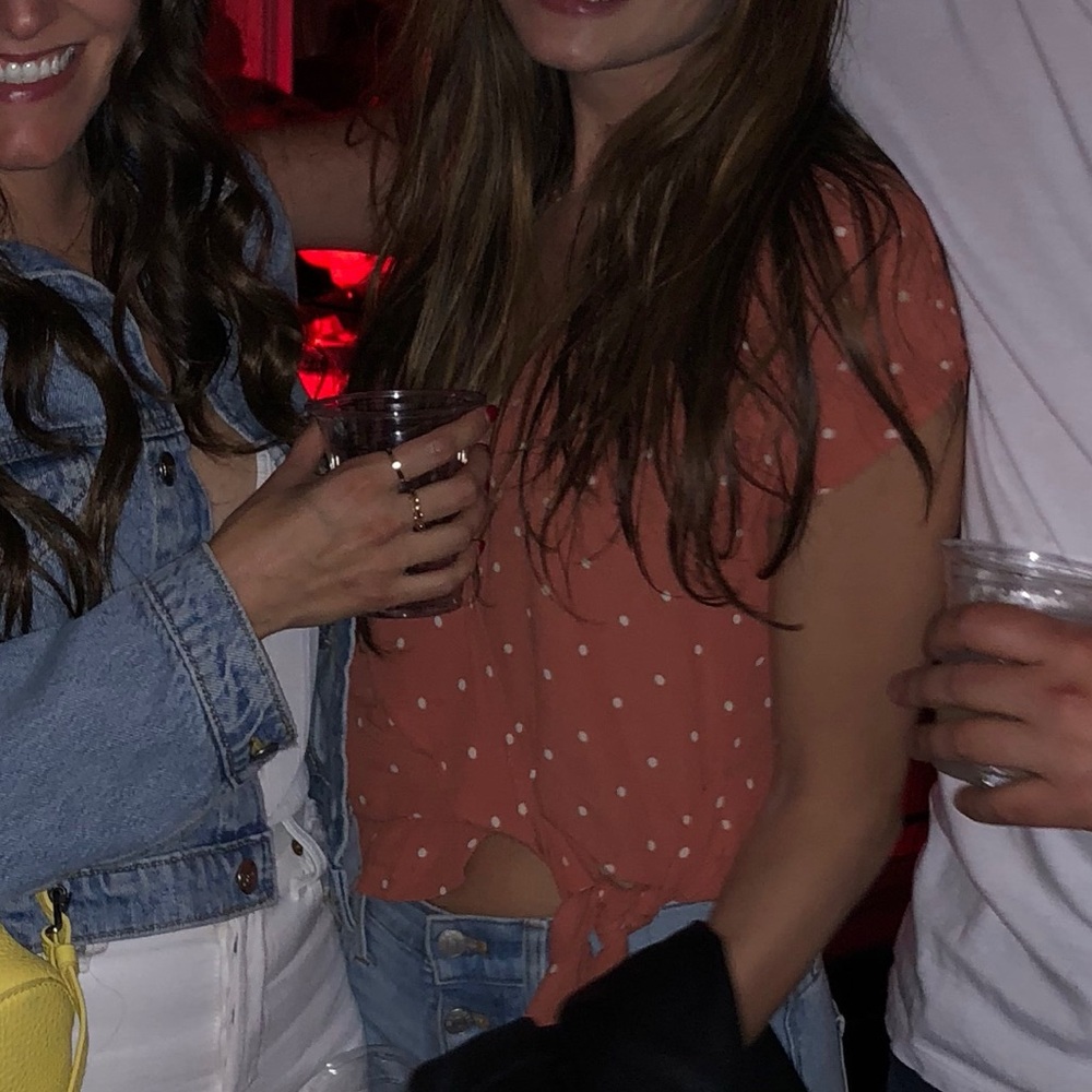 Pink / Salmon colored polka dot shirt